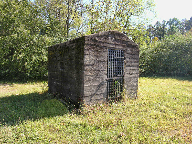 Single-cell brick jail with barred door