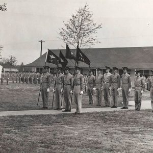 Men in military uniform participating in event