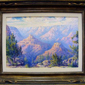 Painting of rock formations in canyon with trees in wooden frame