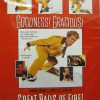 White man in yellow and black suit in various poses on red and white poster