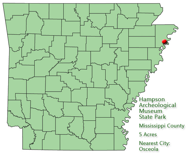 map outlining Arkansas counties with red pin on northeast boundary