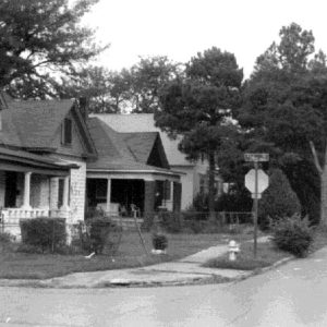 Houses with covered porches on street corner