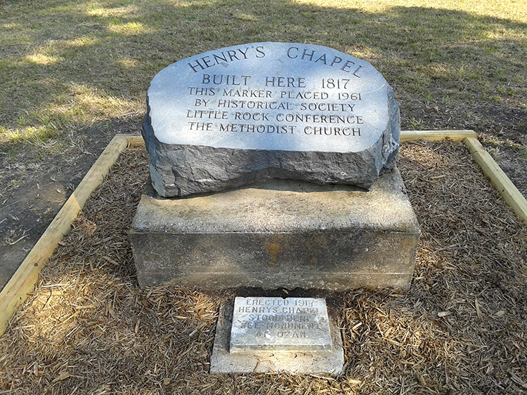 "Henry's Chapel built here 1817 this marker placed 1961 by historical society Little Rock conference the Methodist Church" engraved stone on concrete base