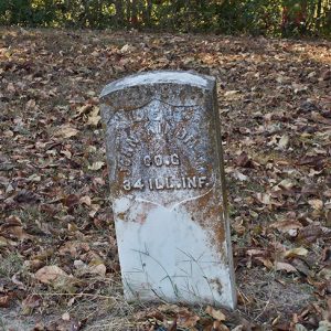Weathered gravestone in cemetery