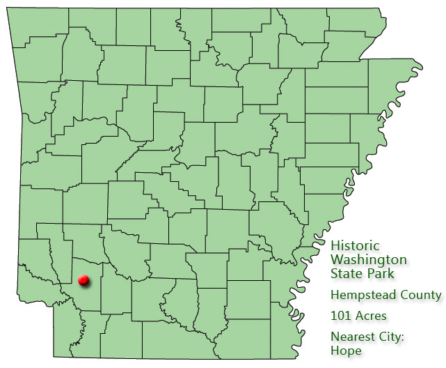 map outlining Arkansas counties with red pin in southwest quadrant