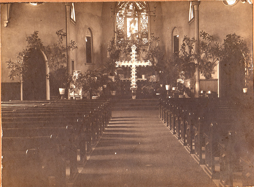 interior of church, with nave and cross visible