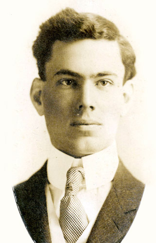 Young white man in suit and tie