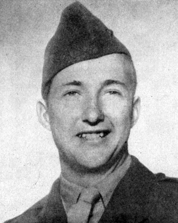 Young white man smiling in military uniform with cap
