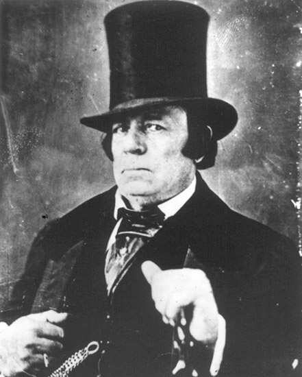 White man in top hat and suit