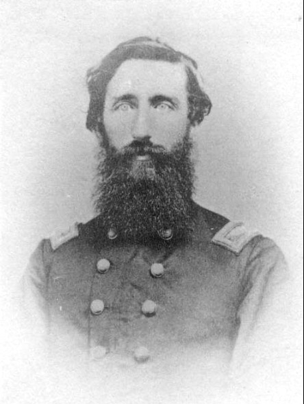 Bearded white man in military uniform