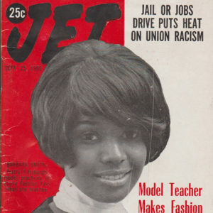 Young African-American woman with short hair smiling in sleeveless dress on red and white magazine cover