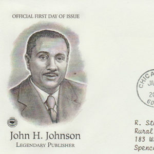 African-American man with mustache in suit and tie with text and on stamp and envelope