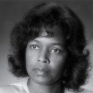 portrait photo of African-American woman with wavy hair