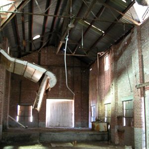 Interior of brick building with metal roof