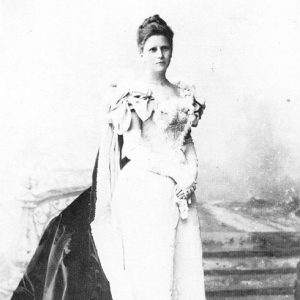 White woman in dress with train