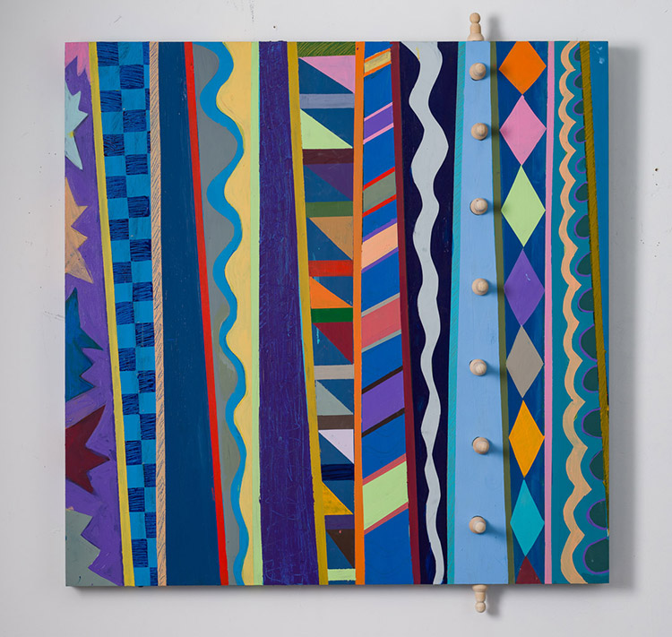 Multicolored geometric patterns and knobs on canvas