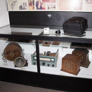Older audio equipment in glass display case