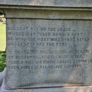 "All lost but by the grave" poem on stone monument