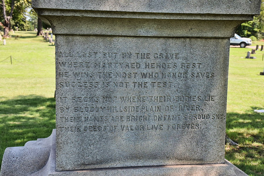 "All lost but by the grave" poem on stone monument