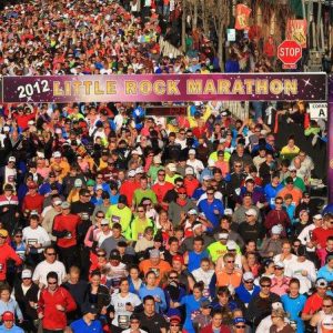 crowd gathered under "2012 Little Rock marathon" banner