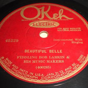 Vinyl record with red and gold label
