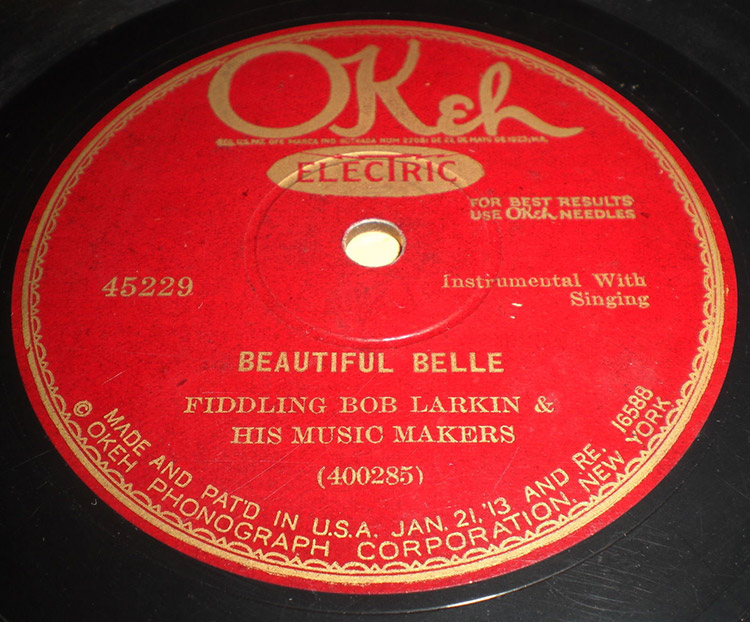 Vinyl record with red and gold label