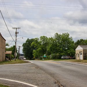 Single-story buildings on two-lane highway