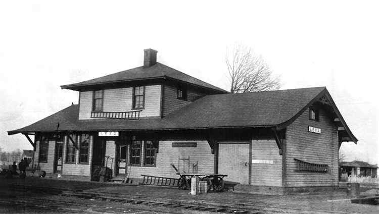 Two-story railroad depot building and tracks