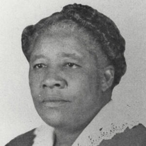 Older African-American woman in collared dress