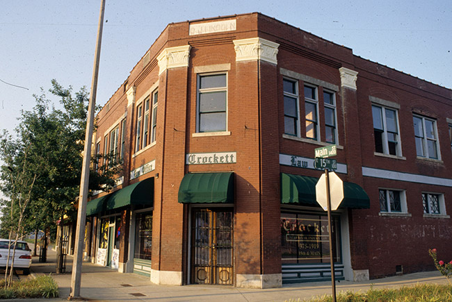 Two-story brick "Crockett Law Office" building on street corner