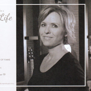 White woman's photo on memorial card