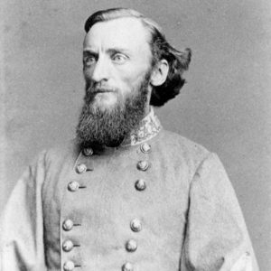 White man with beard and combed back hair in military uniform
