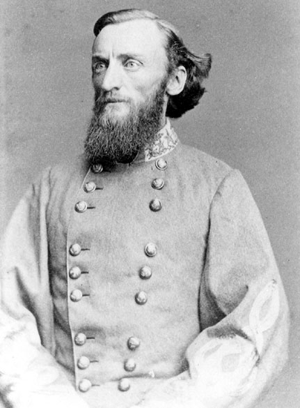 White man with beard and combed back hair in military uniform