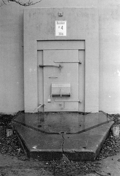 Bunker door with sign above it