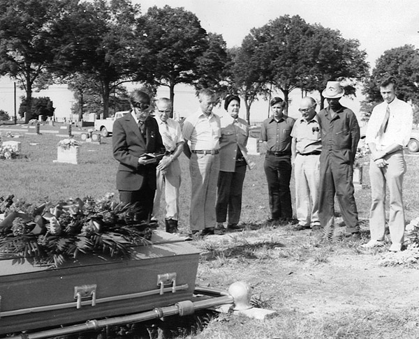 people attending graveside service
