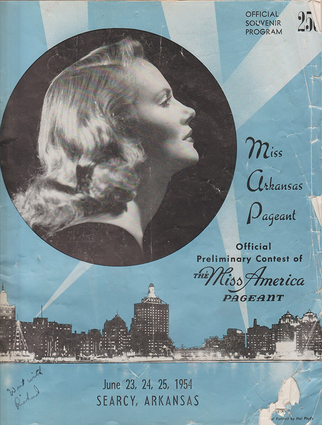 Profile view of young white woman and skyline on "Miss Arkansas Pageant" program cover