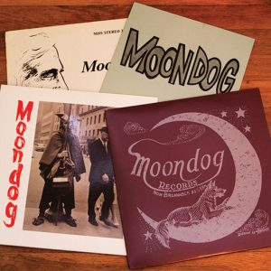 Four "Moondog" records arranged on top of each other