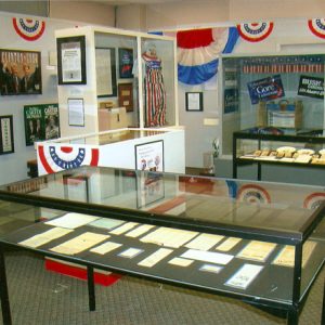 Political artifacts and flyers in display cases