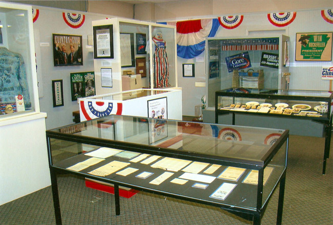 Political artifacts and flyers in display cases