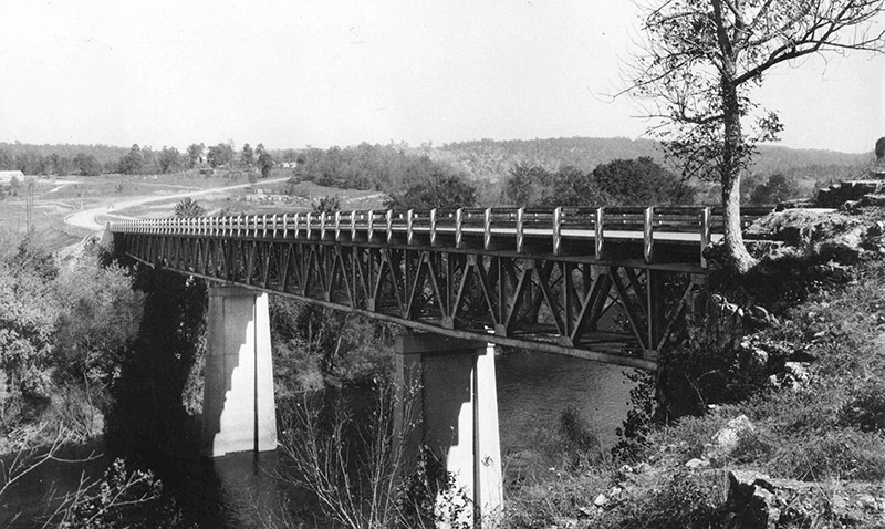 truss bridge spanning river