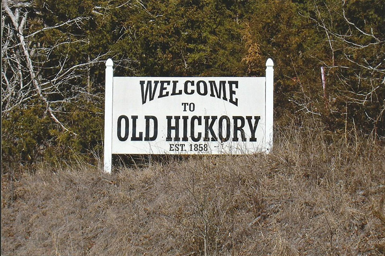 White "Welcome to Old Hickory established 1858" sign on grass