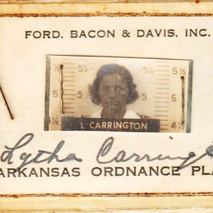 picture of white woman on signed Arkansas Ordinance Plant badge