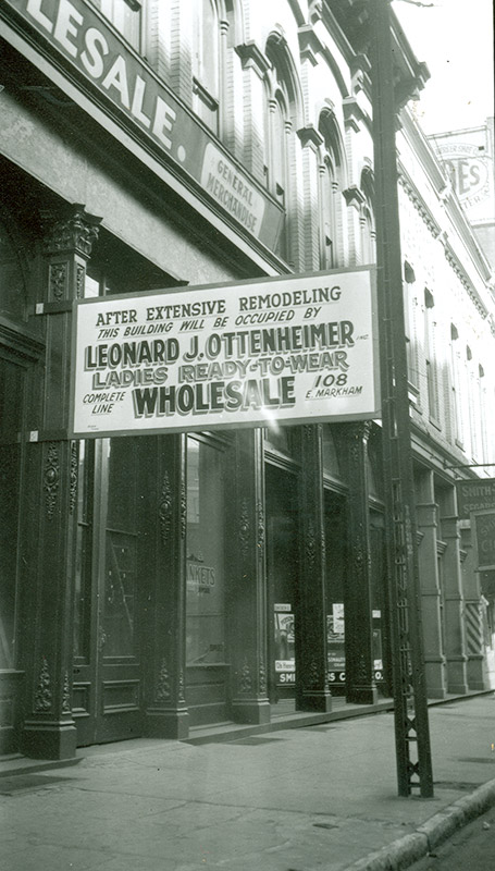 Store front with sign "Ladies Ready to Wear Wholesale"