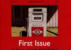Red magazine cover with white text and black text and picture of gas pump