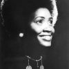 Young African-American woman with afro and necklace