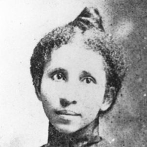 Young African-American woman wearing a dress