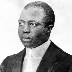 African-American man with short hair in suit