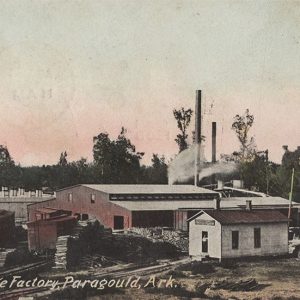 Factory buildings with smoke stacks and piles of lumber on post card