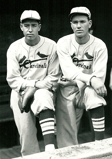 Two white men in St. Louis Cardinals uniforms