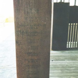 "Lonoke County Arkansas" hanging copper stele among others of the same kind